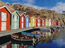 Cabanes de bateaux colorés en Suède | 100XL mcx